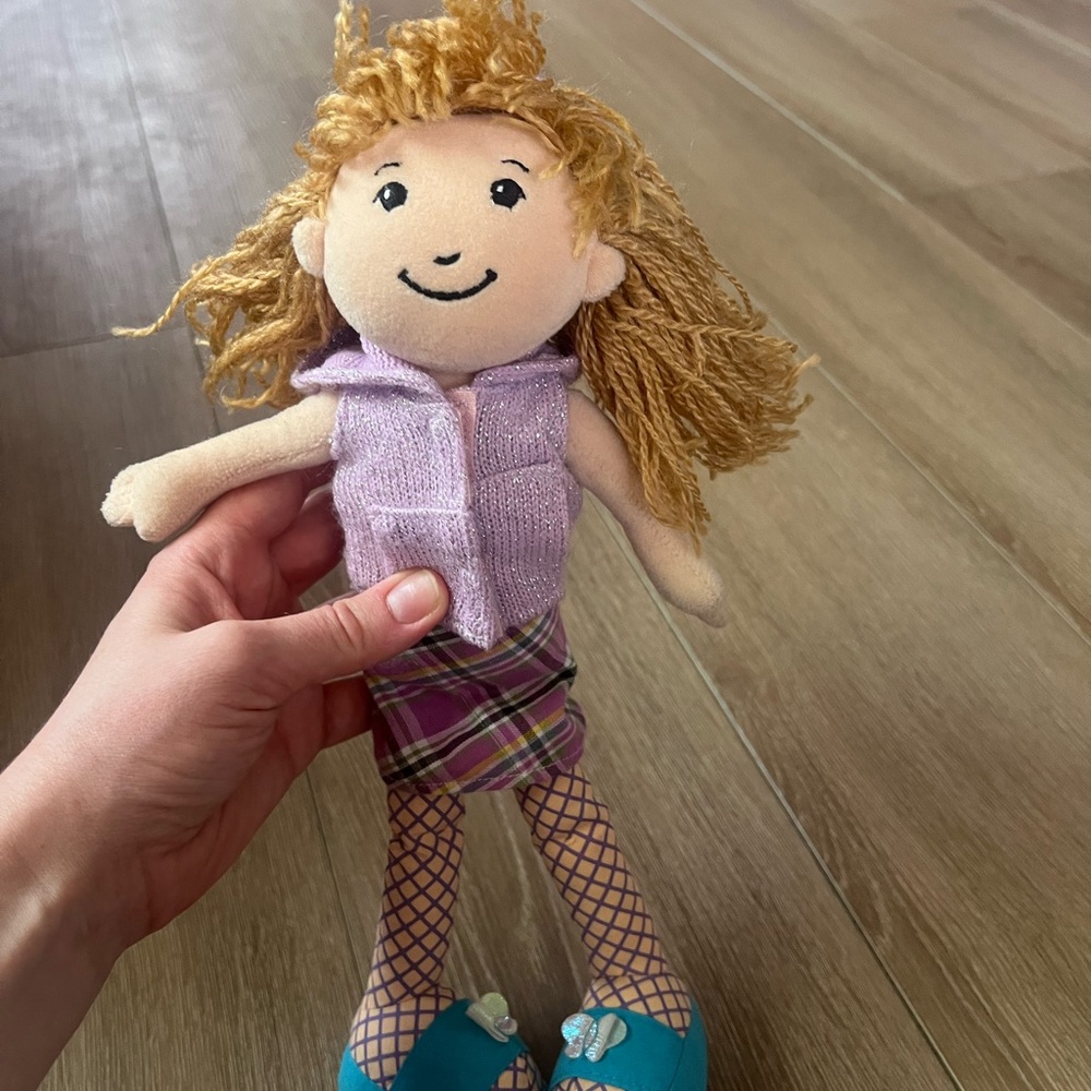 Stylish Doll with Blonde Hair and Plaid Skirt